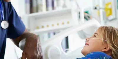 Healthcare professional with young patient